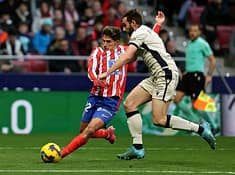 Atletico edge Osasuna to claim top spot with Alvarez goal